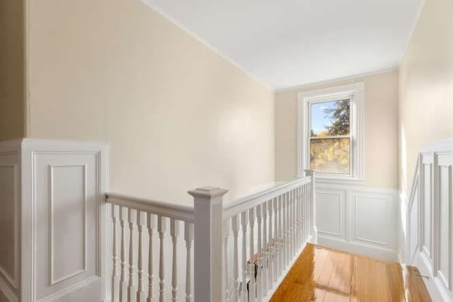 4-6 W St, Arlington, MA 02476 - stairs featuring a decorative wall, wood finished floors, and wainscoting