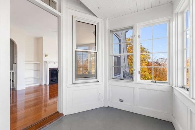 4-6 W St, Arlington, MA 02476 - unfurnished sunroom featuring arched walkways and lofted ceiling
