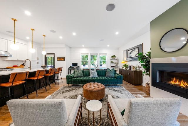 16 Walker St Unit 16, Medford, MA 02155 - living area with a glass covered fireplace, recessed lighting, and baseboards