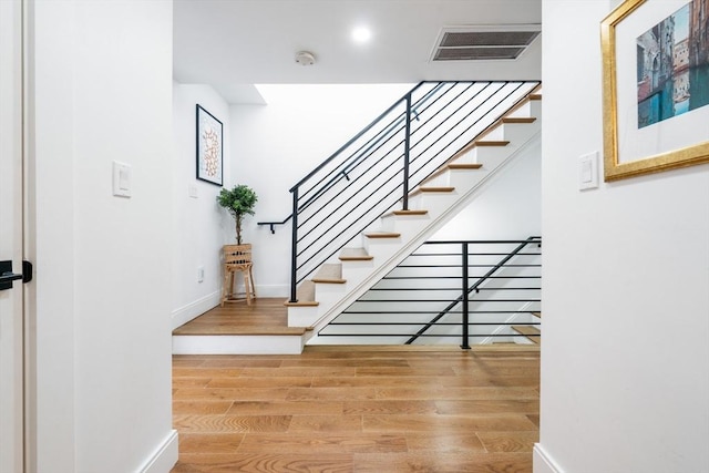 16 Walker St Unit 16, Medford, MA 02155 - staircase featuring wood finished floors and baseboards