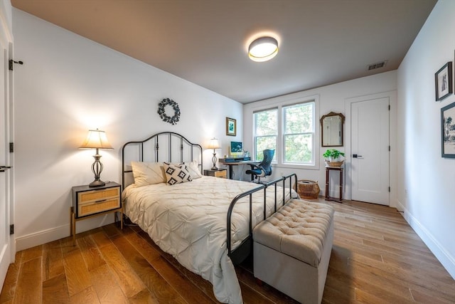 16 Walker St Unit 16, Medford, MA 02155 - bedroom with wood finished floors and baseboards