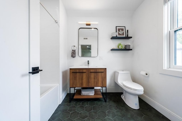 16 Walker St Unit 16, Medford, MA 02155 - full bath with vanity, toilet, baseboards, tile patterned floors, and shower / tub combination
