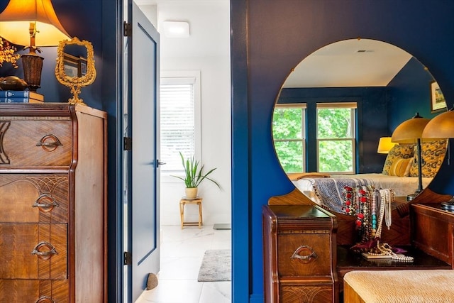 16 Walker St Unit 16, Medford, MA 02155 - bedroom featuring arched walkways and marble look tiles