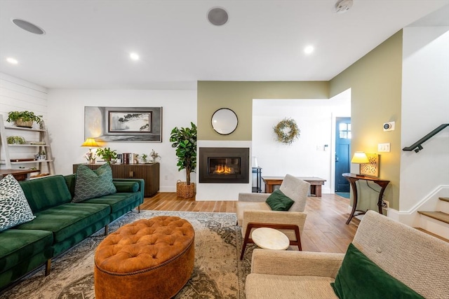 16 Walker St Unit 16, Medford, MA 02155 - living room with wood finished floors, stairway, a glass covered fireplace, recessed lighting, and baseboards