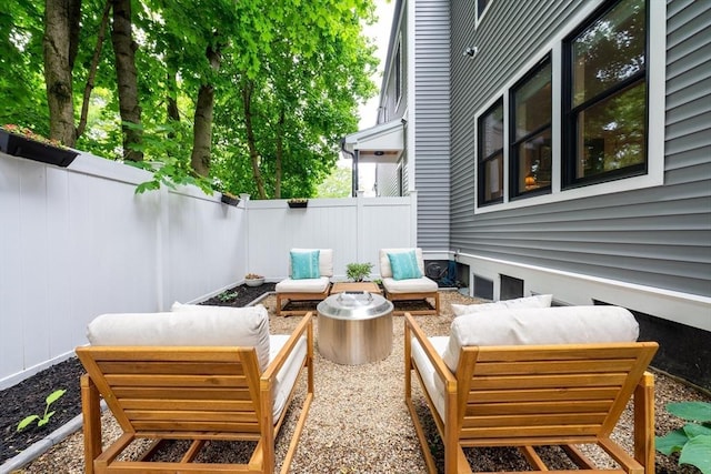 16 Walker St Unit 16, Medford, MA 02155 - fenced backyard with an outdoor hangout area
