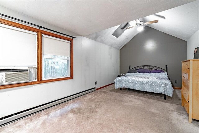 bedroom featuring lofted ceiling, a baseboard heating unit, ceiling fan, and carpet