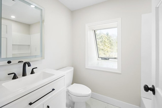 full bathroom with baseboards, marble finish floor, vanity, and toilet