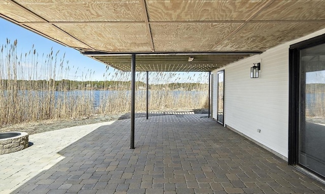 view of patio / terrace with a water view