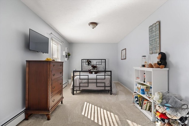 bedroom featuring baseboards, light colored carpet, and baseboard heating