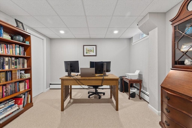 office featuring light carpet, baseboards, baseboard heating, and recessed lighting