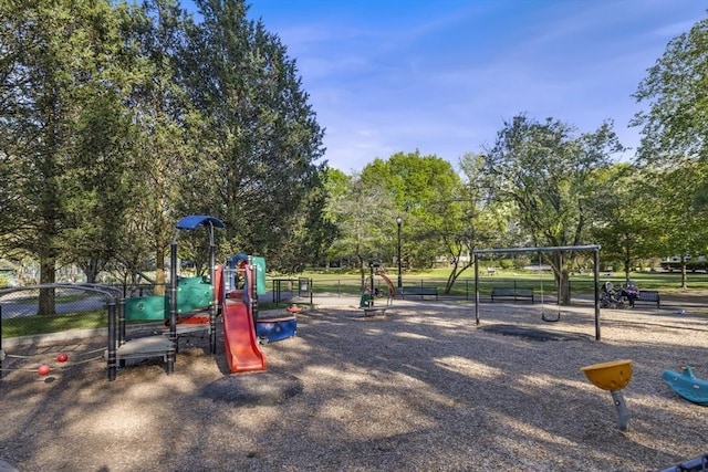 35 Russell Unit 1, Brookline, MA 02446 - community jungle gym with fence and view of scattered trees