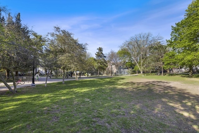 surrounding community featuring a yard