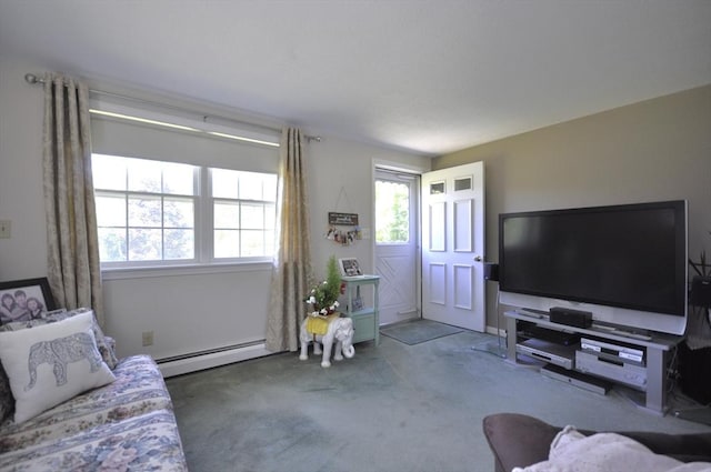 706 Washington St, East Bridgewater, MA 02333 - carpeted living room featuring a baseboard heating unit