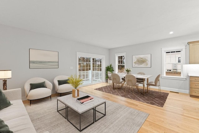 27 Leonard St Unit 27, Bridgewater, MA 02324 - living area featuring light wood-style flooring and recessed lighting