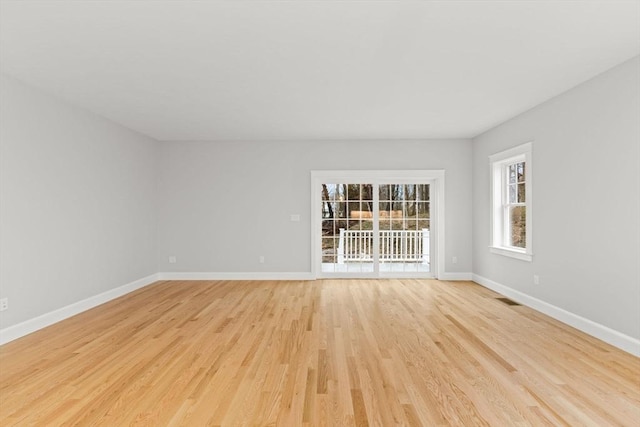 27 Leonard St Unit 27, Bridgewater, MA 02324 - empty room with light wood-style flooring and baseboards