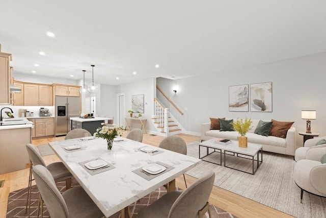 27 Leonard St Unit 27, Bridgewater, MA 02324 - dining room with light wood-style flooring, stairs, and recessed lighting