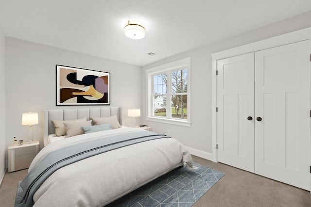 27 Leonard St Unit 27, Bridgewater, MA 02324 - carpeted bedroom featuring baseboards and a closet