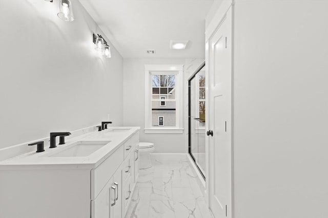 27 Leonard St Unit 27, Bridgewater, MA 02324 - bathroom with marble finish flooring, a stall shower, and double vanity