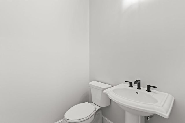 27 Leonard St Unit 27, Bridgewater, MA 02324 - bathroom featuring baseboards and toilet