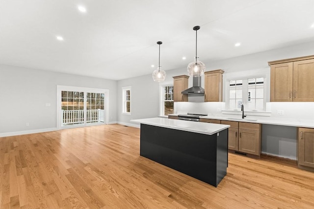 27 Leonard St Unit 27, Bridgewater, MA 02324 - kitchen with wall chimney range hood, a kitchen island, light countertops, recessed lighting, and decorative light fixtures