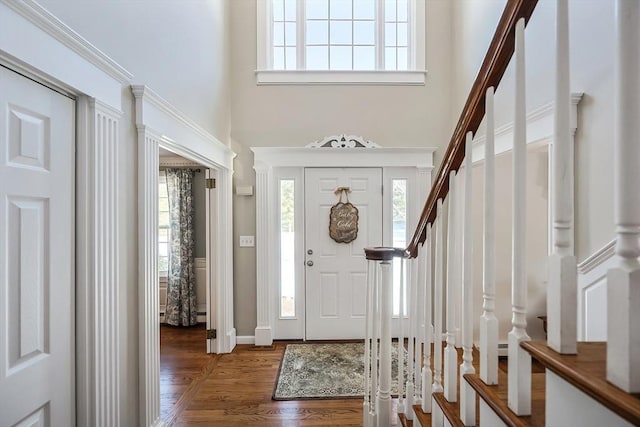 entrance foyer featuring dark hardwood / wood-style flooring