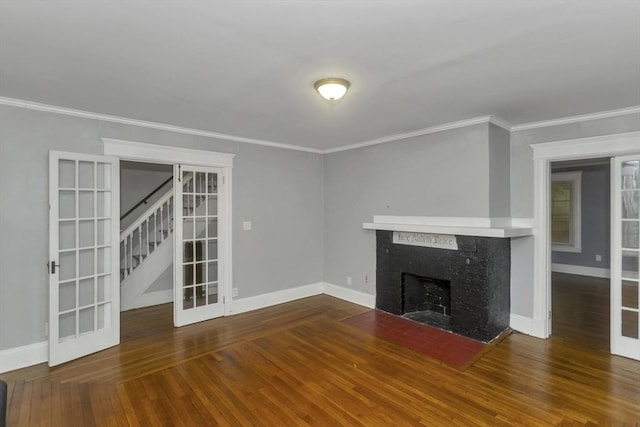 80 Rochelle St, Springfield, MA 01109 - unfurnished living room featuring a fireplace, wood finished floors, ornamental molding, baseboards, and stairs