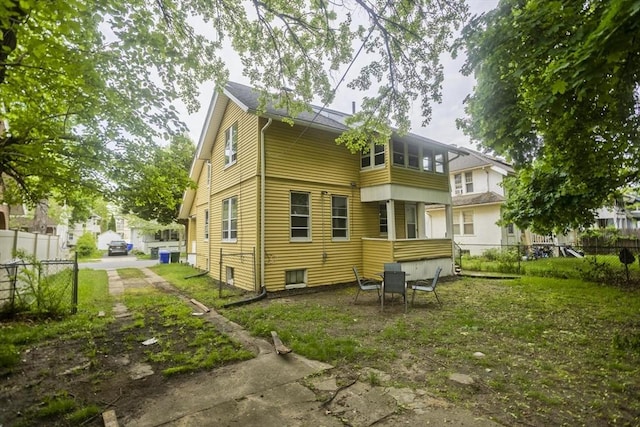 80 Rochelle St, Springfield, MA 01109 - rear view of property featuring fence