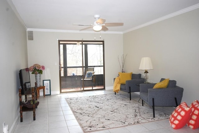 living area featuring ceiling fan, crown molding, and tile patterned floors