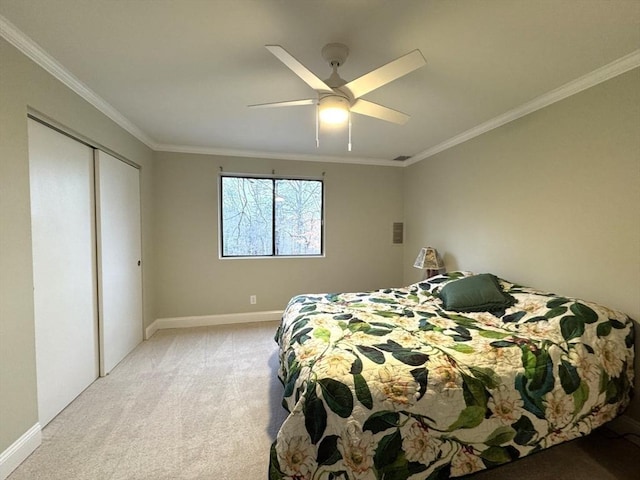 bedroom featuring ornamental molding, light colored carpet, and baseboards