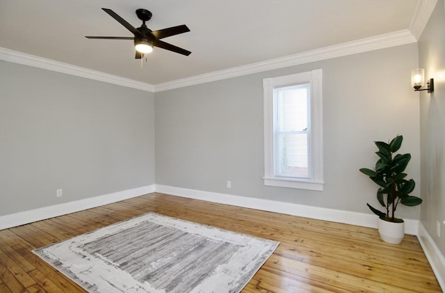 unfurnished room with ornamental molding, ceiling fan, and wood-type flooring