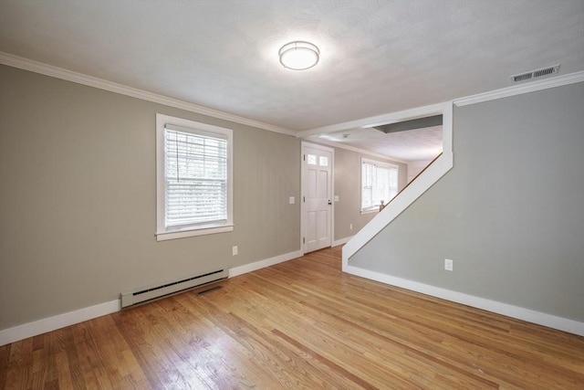 313 Bennett Rd, Hampden, MA 01036 - unfurnished room with baseboard heating, baseboards, ornamental molding, and light wood finished floors