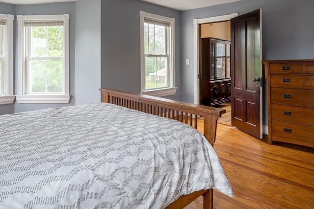 bedroom with light wood-type flooring