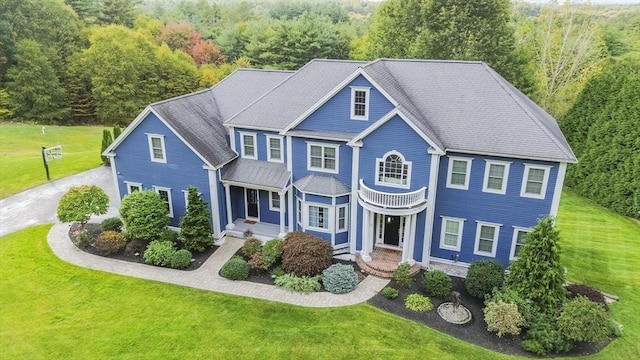25 Collins Rd, Berlin, MA 01503 - colonial house featuring a wooded view and a front lawn