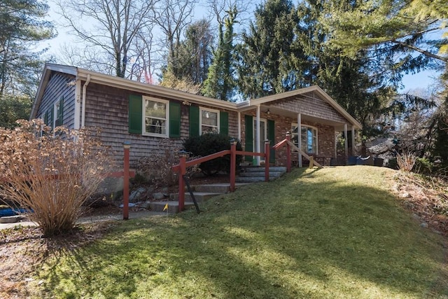 single story home with a front yard