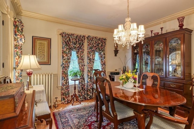 70 Main St, Northborough, MA 01532 - dining space with a chandelier, ornamental molding, and wood finished floors