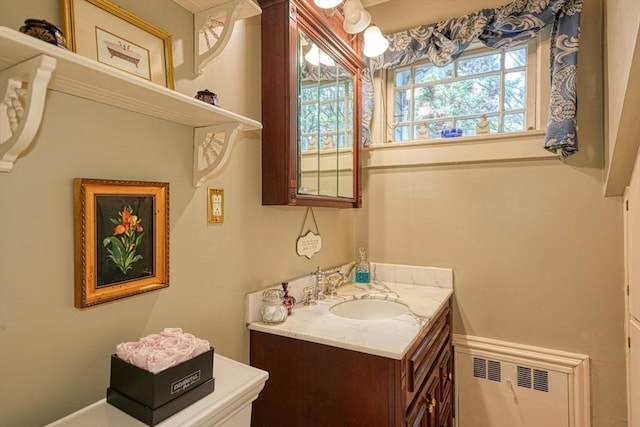 70 Main St, Northborough, MA 01532 - bathroom featuring vanity and radiator