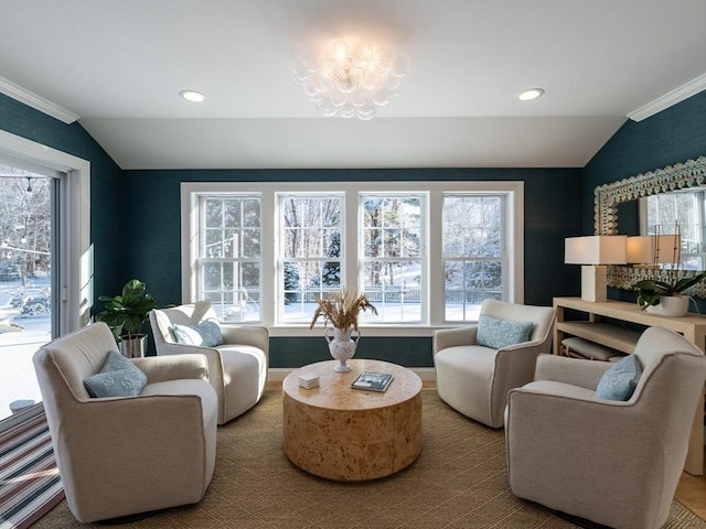 interior space featuring a healthy amount of sunlight and vaulted ceiling