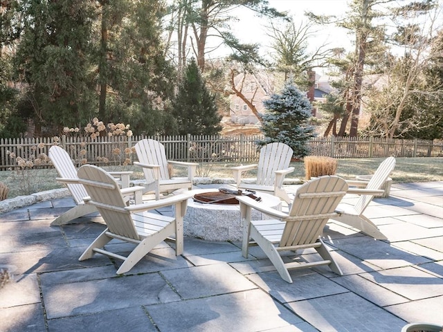 view of patio with a fire pit