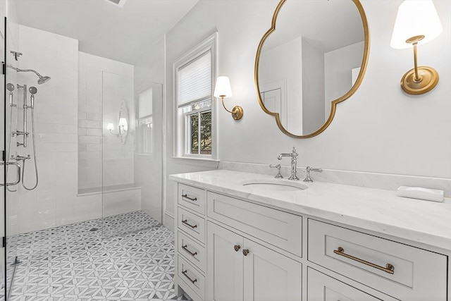 bathroom with vanity and an enclosed shower