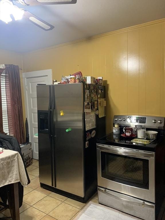 295 Grove St, Brockton, MA 02302 - kitchen featuring appliances with stainless steel finishes, light tile patterned floors, and ornamental molding