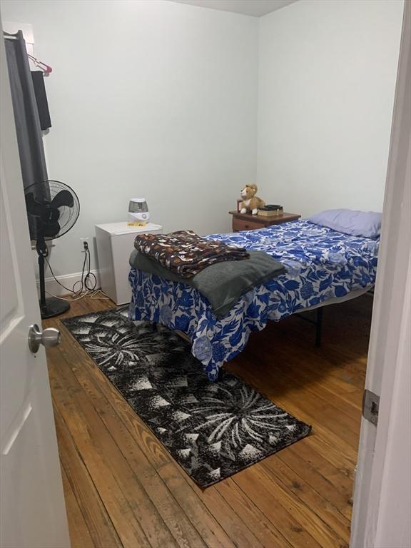 295 Grove St, Brockton, MA 02302 - bedroom featuring hardwood / wood-style floors