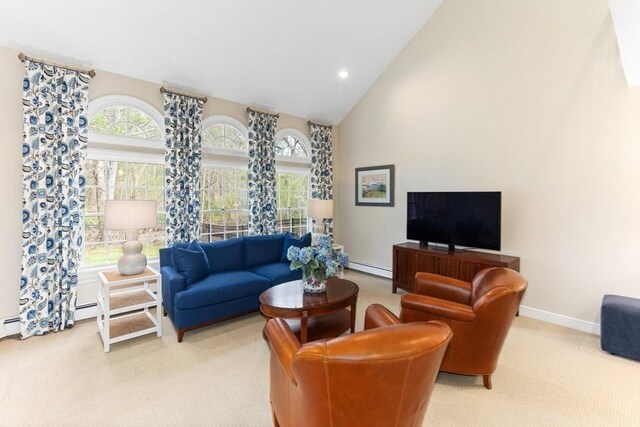 carpeted living room with baseboards, high vaulted ceiling, recessed lighting, and a baseboard radiator