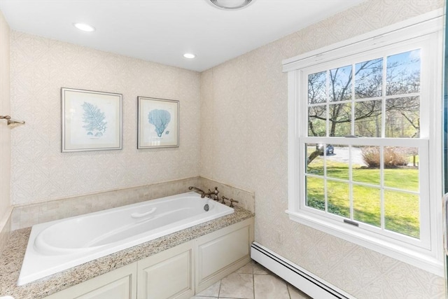 full bathroom with wallpapered walls, a healthy amount of sunlight, a garden tub, and baseboard heating