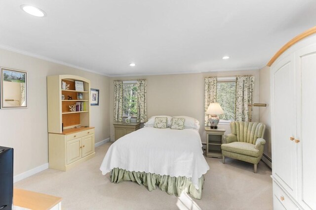 bedroom with light carpet, baseboards, ornamental molding, and multiple windows