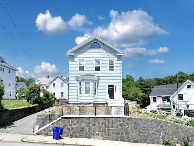 419 Poplar St, Boston, MA 02131 - view of front of house with a fenced front yard