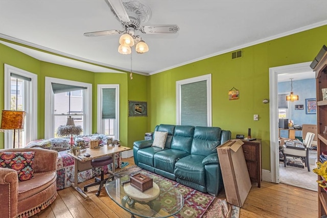 419 Poplar St, Boston, MA 02131 - living room featuring hardwood / wood-style floors, a ceiling fan, and ornamental molding