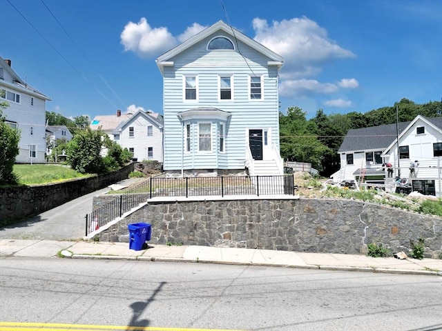 419 Poplar St, Boston, MA 02131 - traditional-style house with a fenced front yard and a residential view