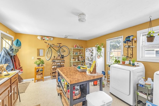 419 Poplar St, Boston, MA 02131 - kitchen with washer / dryer and baseboards