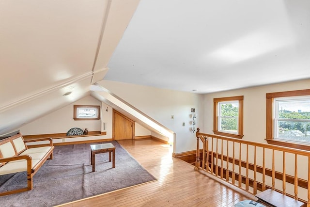 419 Poplar St, Boston, MA 02131 - living room featuring hardwood / wood-style floors and lofted ceiling
