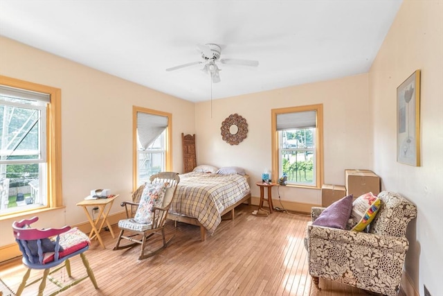 419 Poplar St, Boston, MA 02131 - bedroom with light wood-type flooring and a ceiling fan